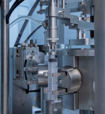 Otomatik Aseptik Tek kullanımlık sıvı ilaç Plastik Ön Doldurulmuş Şırınga Pfs Doldurma Makinesi